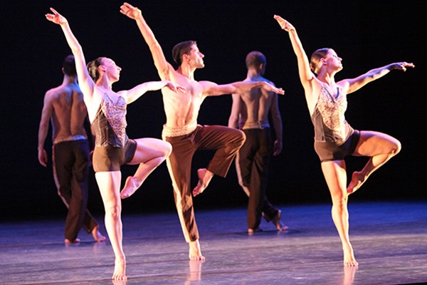 Dance group performing on stage