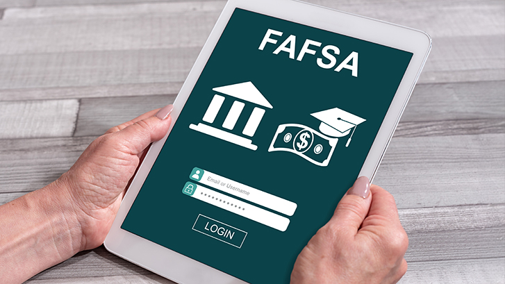 Student applying for FAFSA on his tablet device